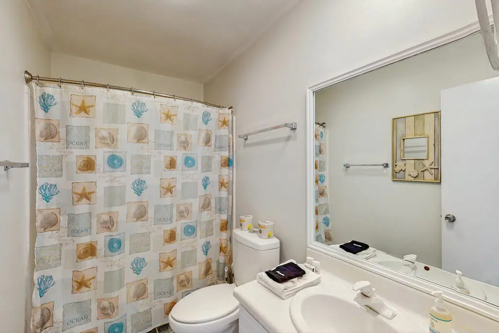 Welcoming villa with pool, beach access, patio, central AC, & washer/dryer