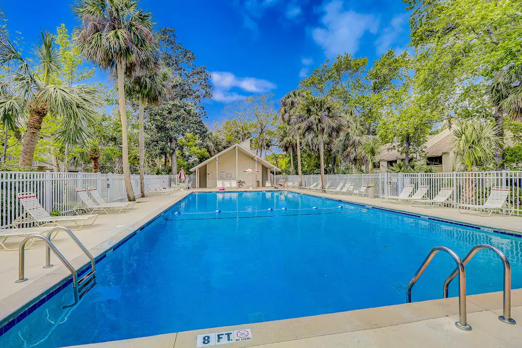 Welcoming villa with pool, beach access, patio, central AC, & washer/dryer