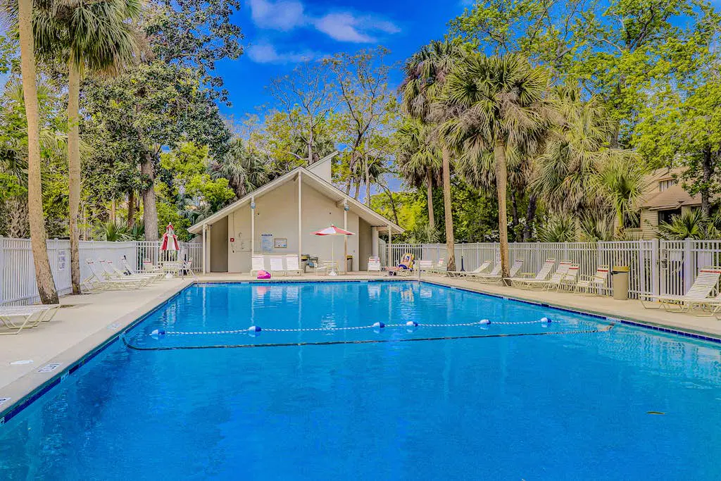 Welcoming villa with pool, beach access, patio, central AC, & washer/dryer