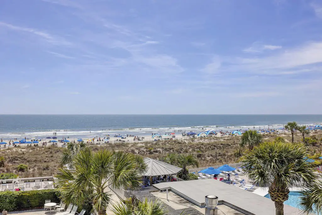 Panoramic direct oceanfront view condo w/ pool, hot tub, gym & steps to beach