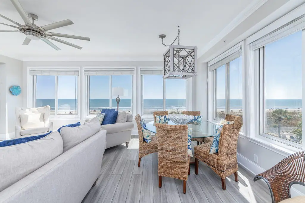Panoramic direct oceanfront view condo w/ pool, hot tub, gym & steps to beach