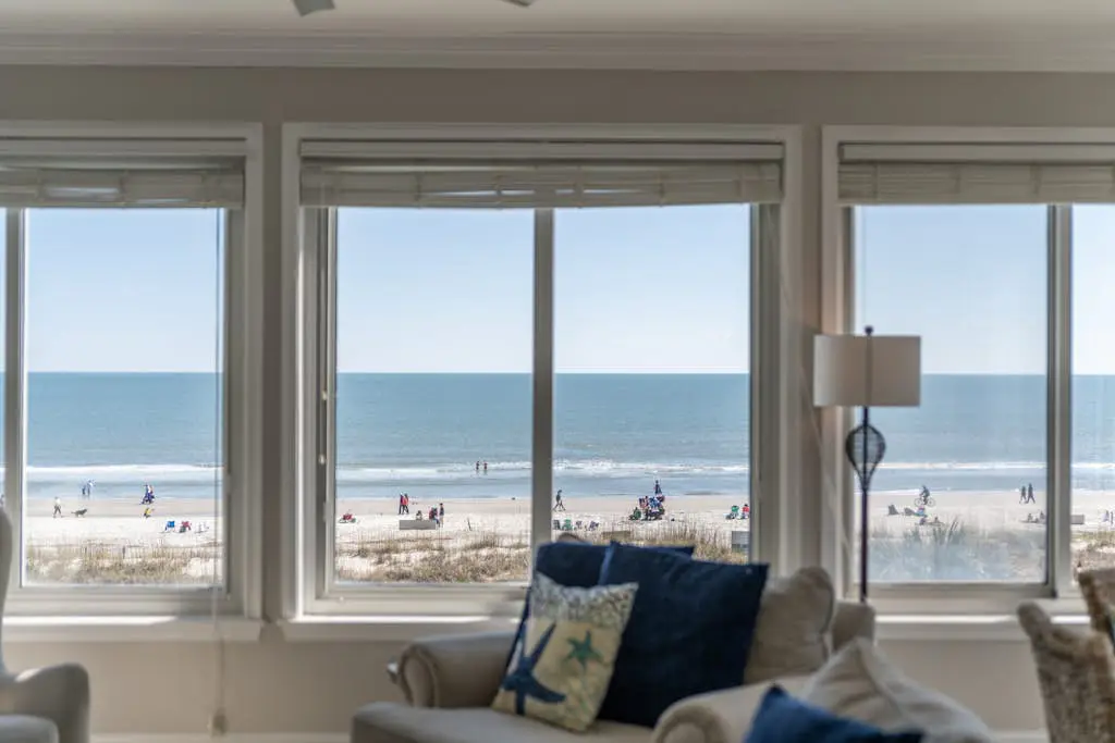 Panoramic direct oceanfront view condo w/ pool, hot tub, gym & steps to beach