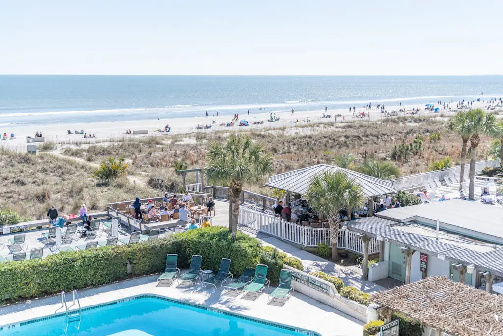 Panoramic direct oceanfront view condo w/ pool, hot tub, gym & steps to beach