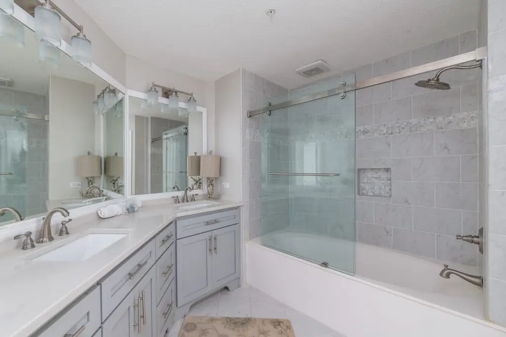 Panoramic direct oceanfront view condo w/ pool, hot tub, gym & steps to beach
