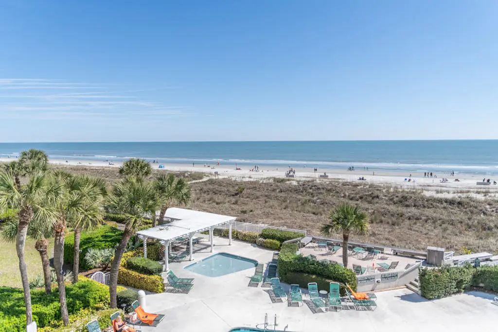 Panoramic direct oceanfront view condo w/ pool, hot tub, gym & steps to beach