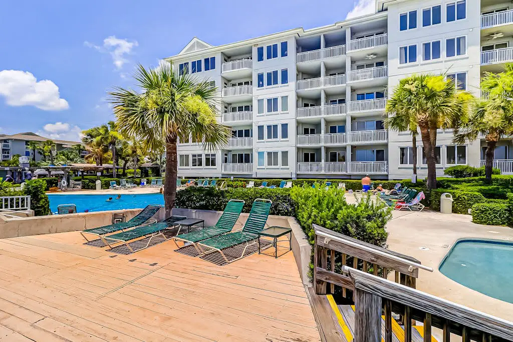 Panoramic direct oceanfront view condo w/ pool, hot tub, gym & steps to beach