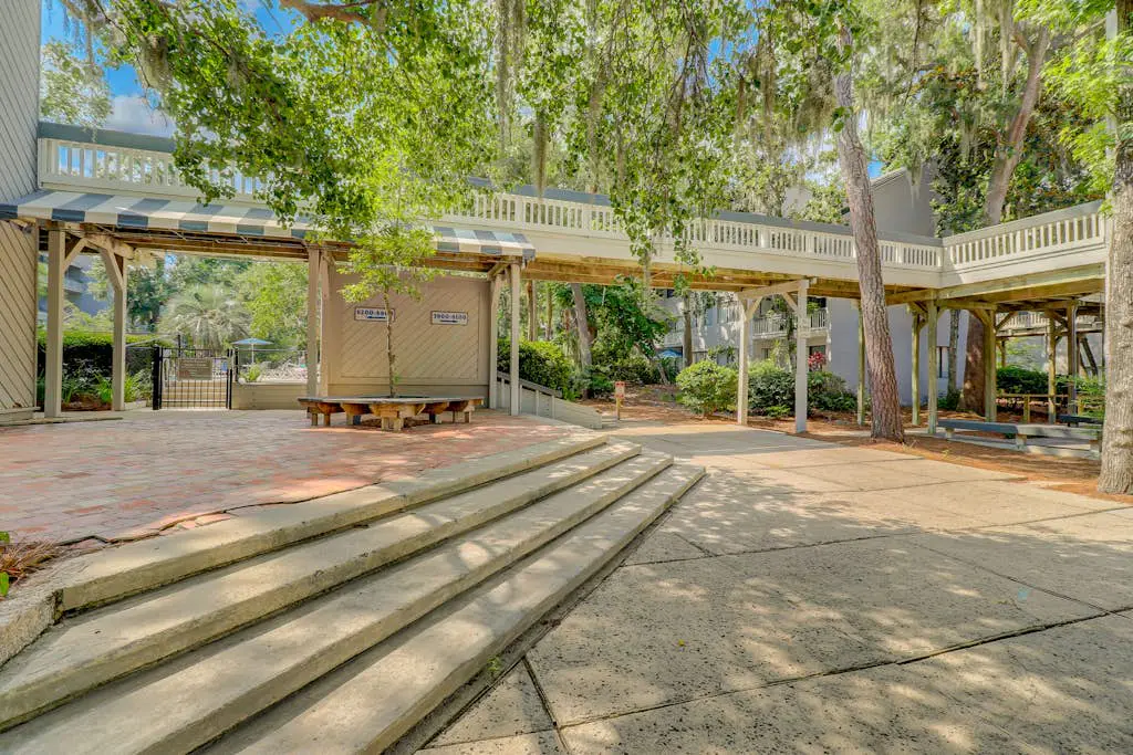 Coastal condo with outdoor pool, walk to beach and shopping