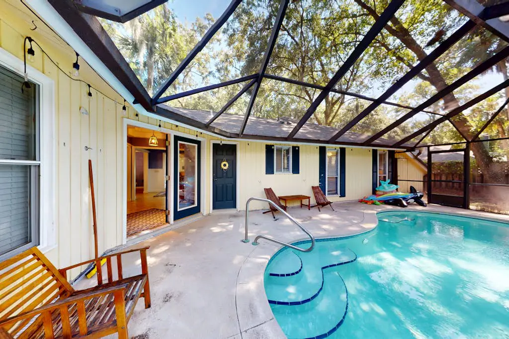 Home with private pool, fenced in yard, dog-friendly, walk to beach