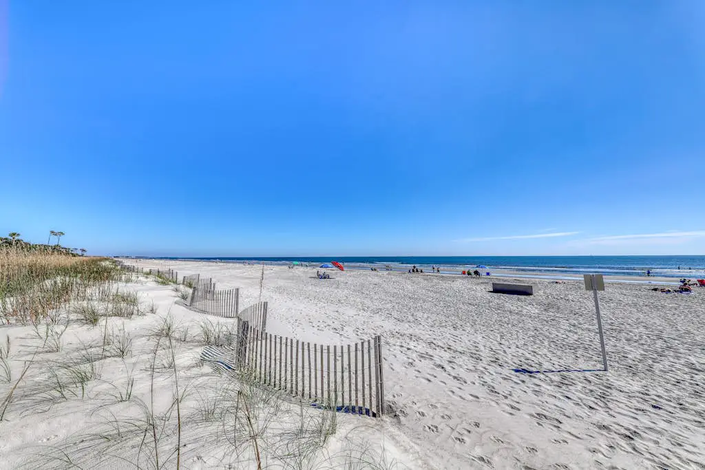 Dog-Friendly Condo with pool, golf, and just steps to the beach