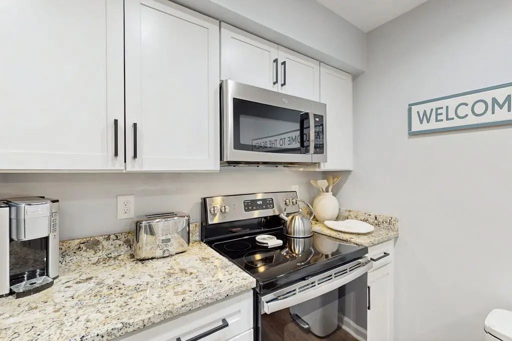Dog-Friendly Condo with pool, golf, and just steps to the beach
