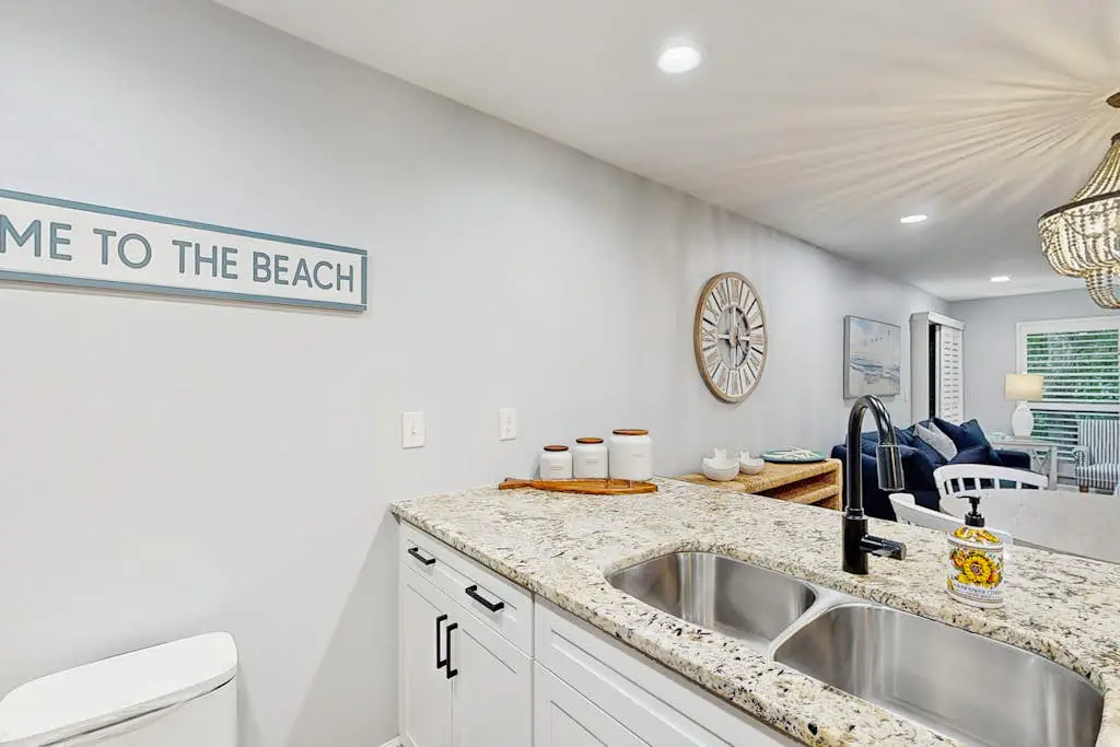 Dog-Friendly Condo with pool, golf, and just steps to the beach