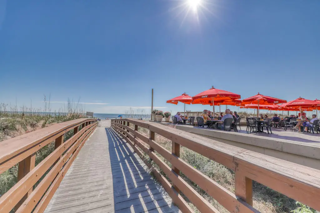 Dog-Friendly Condo with pool, golf, and just steps to the beach