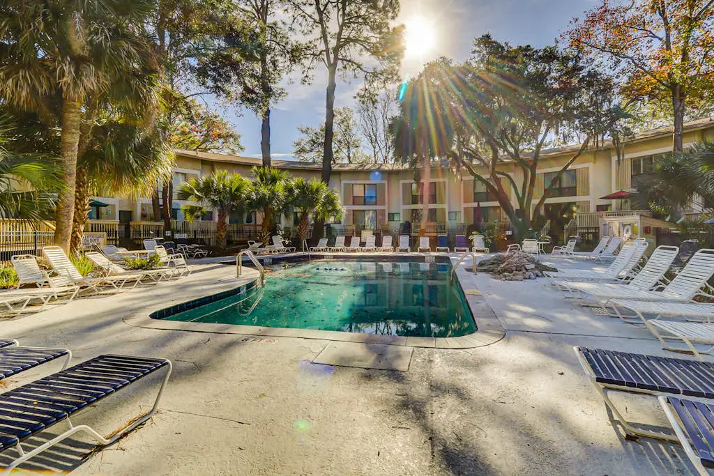 Villa with a 2 outdoor pools, bike paths, and a short walk to Coligny Beach