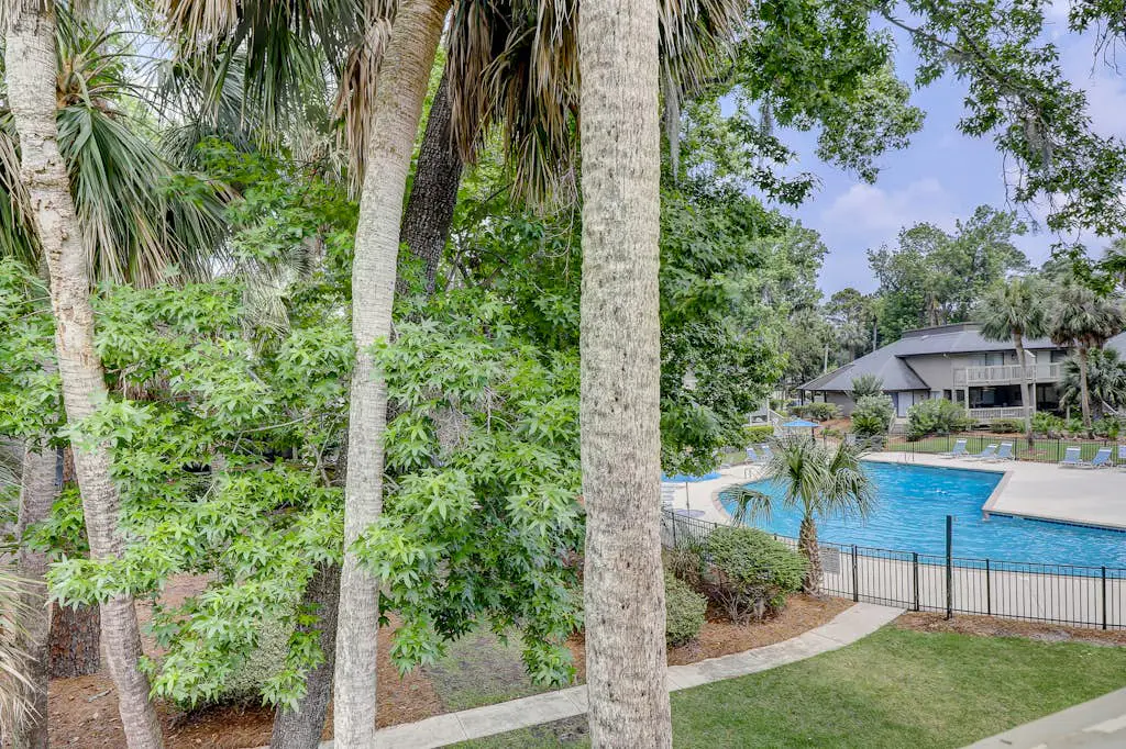 Beautifully remodeled villa w/ WiFi, inviting porch & balconies - walk to beach