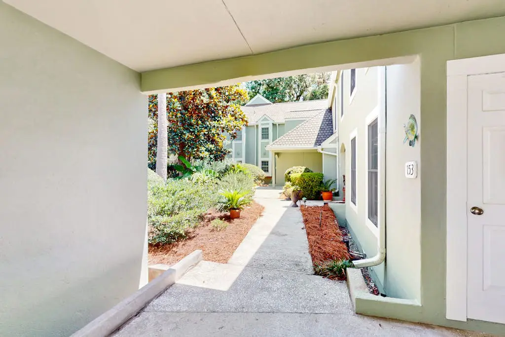 Stunningly remodeled villa with shared pool and golf on-site