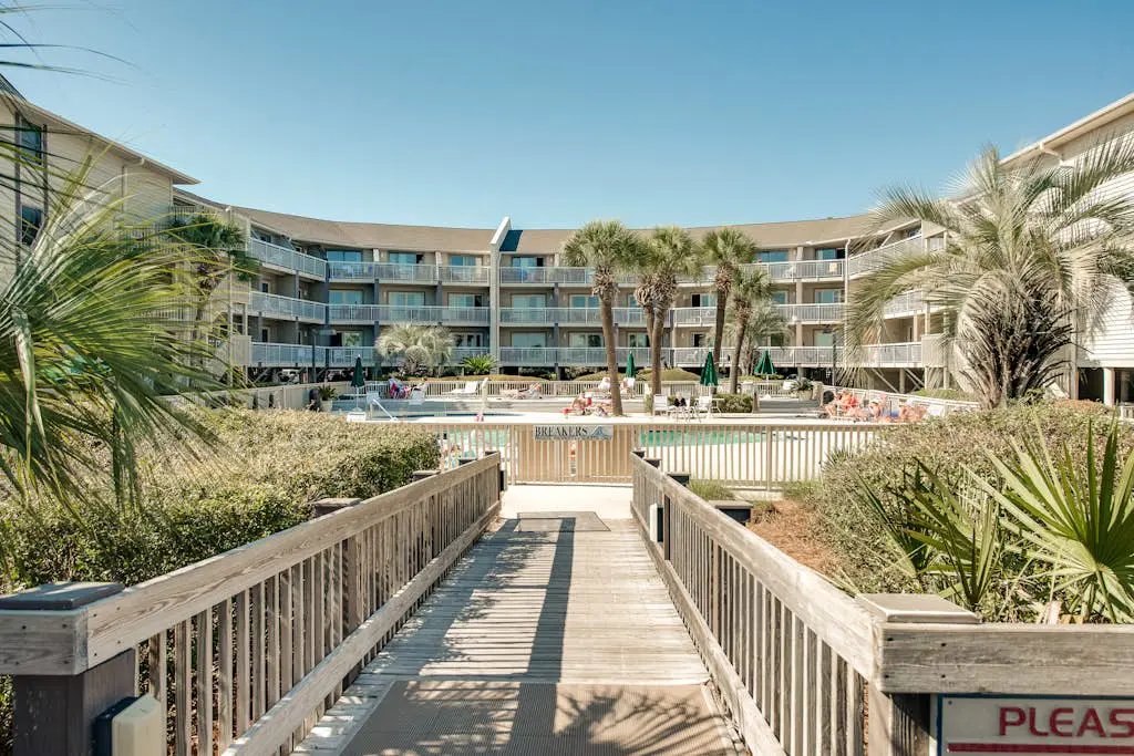 Beachside Condo with Shared Pool & Private Balcony Retreat
