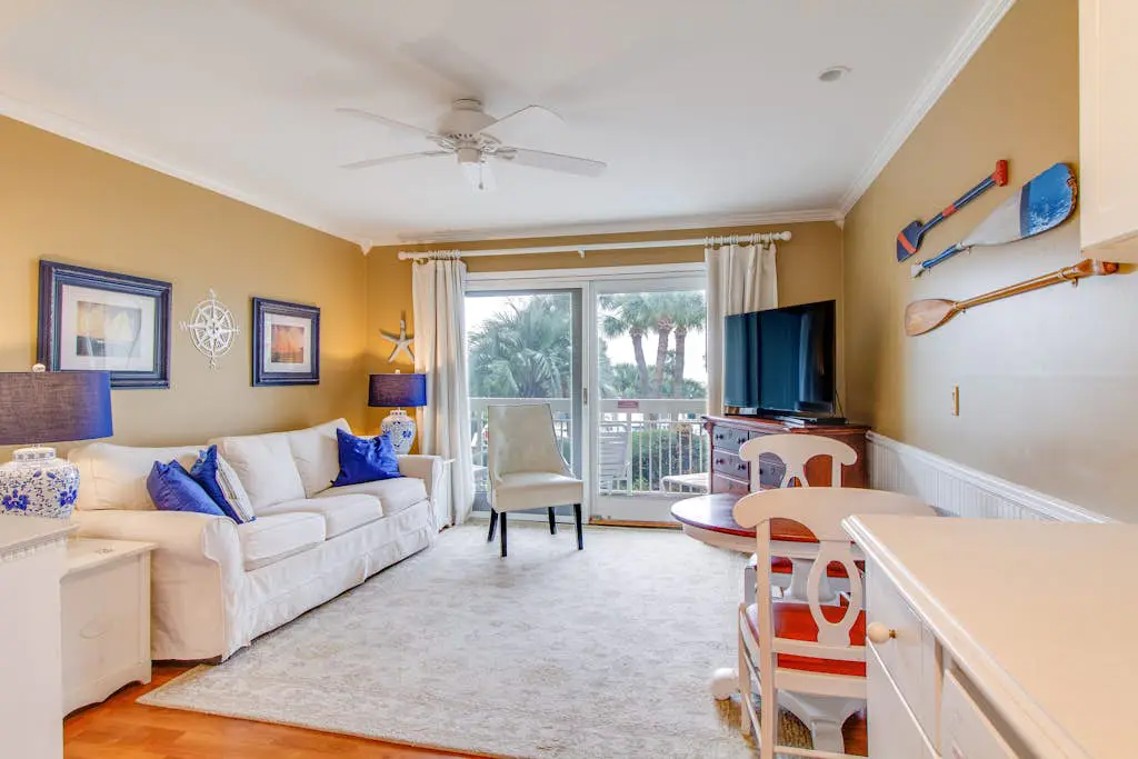 Beachside Condo with Shared Pool & Private Balcony Retreat