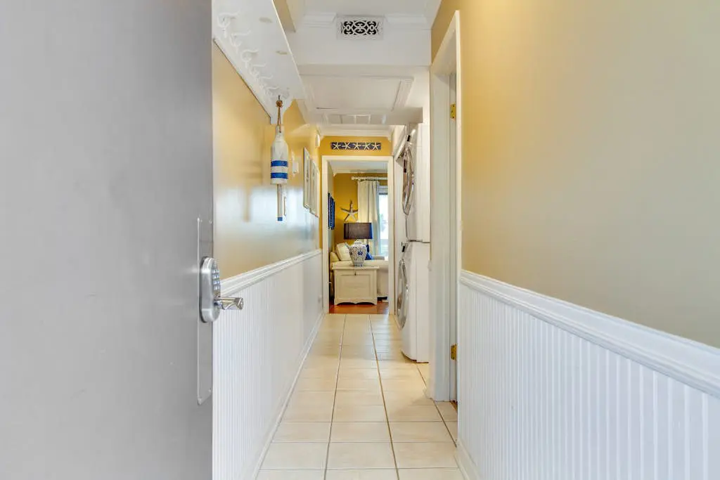 Beachside Condo with Shared Pool & Private Balcony Retreat