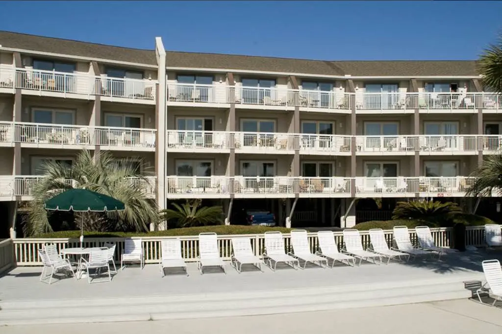 Beachside Condo with Shared Pool & Private Balcony Retreat
