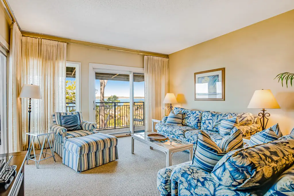 Beachfront condo with large furnished balcony, pool & beautiful views