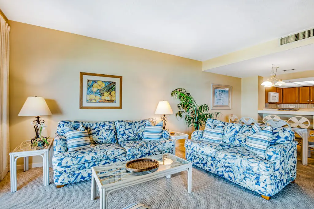 Beachfront condo with large furnished balcony, pool & beautiful views