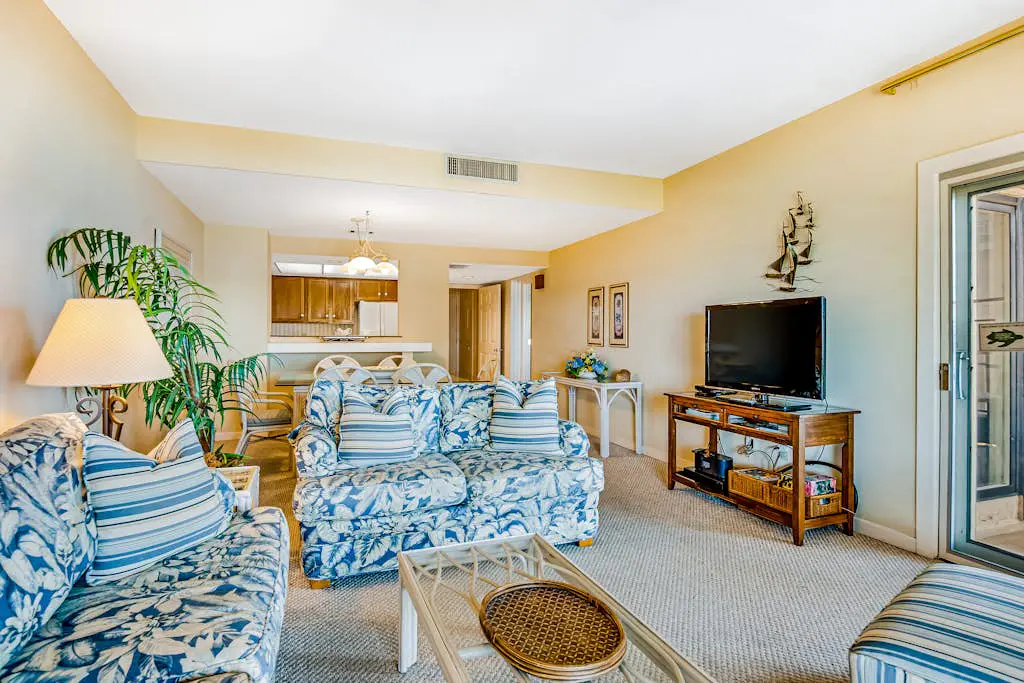 Beachfront condo with large furnished balcony, pool & beautiful views