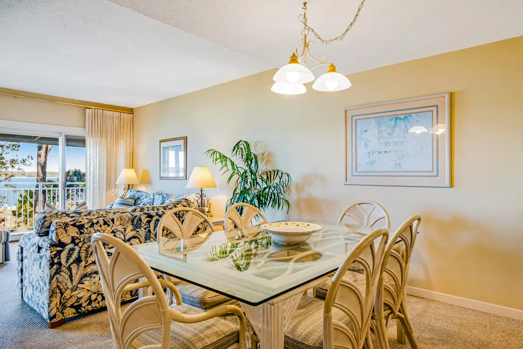 Beachfront condo with large furnished balcony, pool & beautiful views