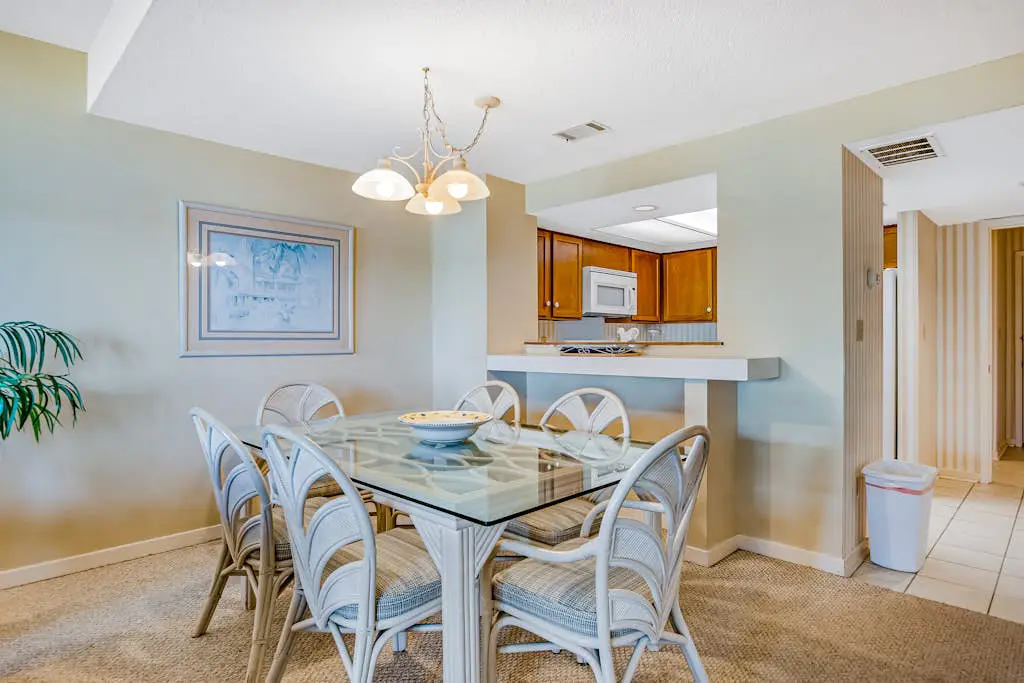 Beachfront condo with large furnished balcony, pool & beautiful views