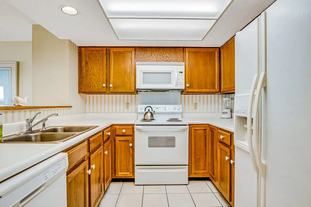 Beachfront condo with large furnished balcony, pool & beautiful views