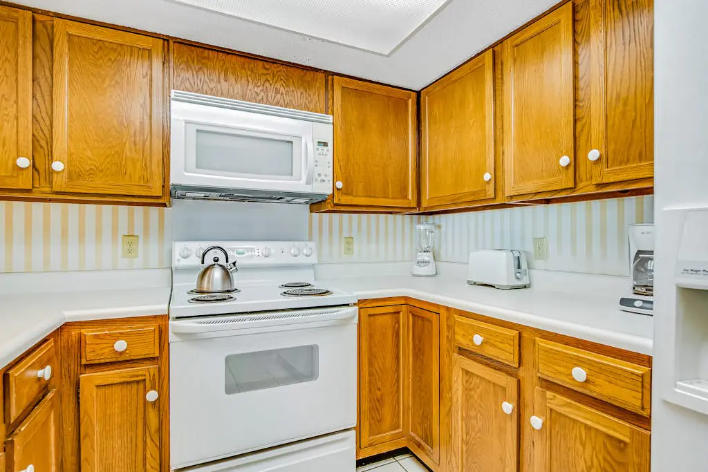 Beachfront condo with large furnished balcony, pool & beautiful views