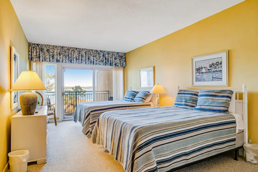 Beachfront condo with large furnished balcony, pool & beautiful views