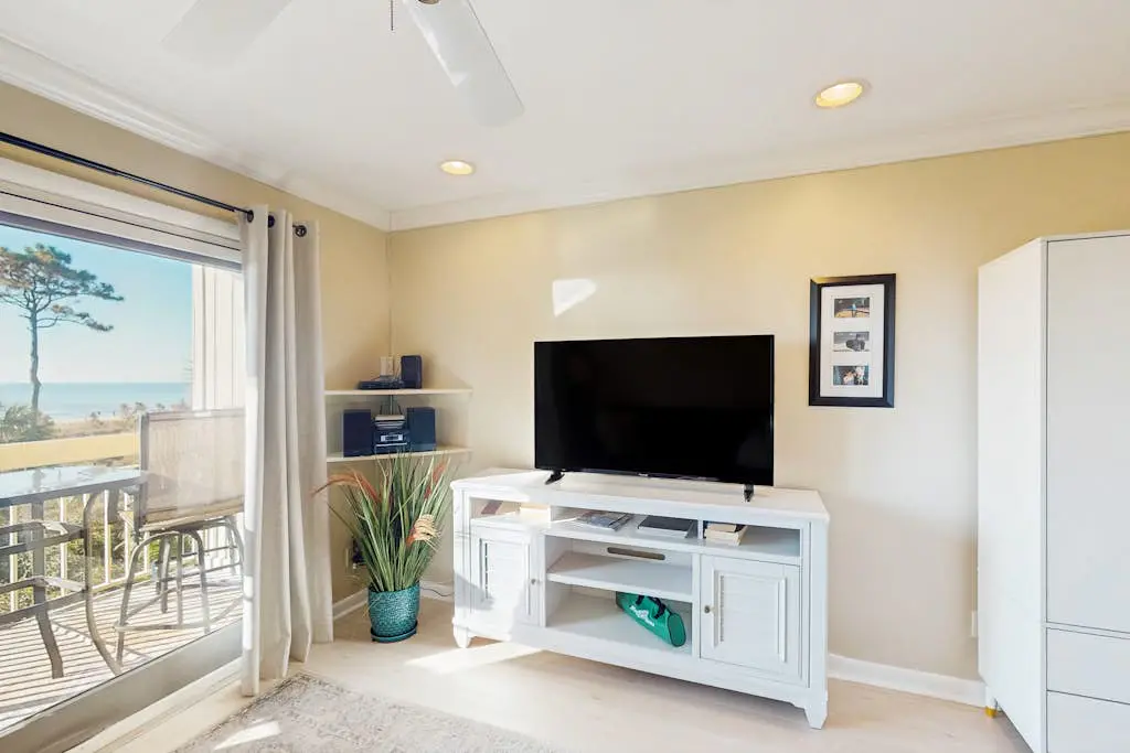 Coastal condo w/ a shared pool - steps to the beach Near shopping