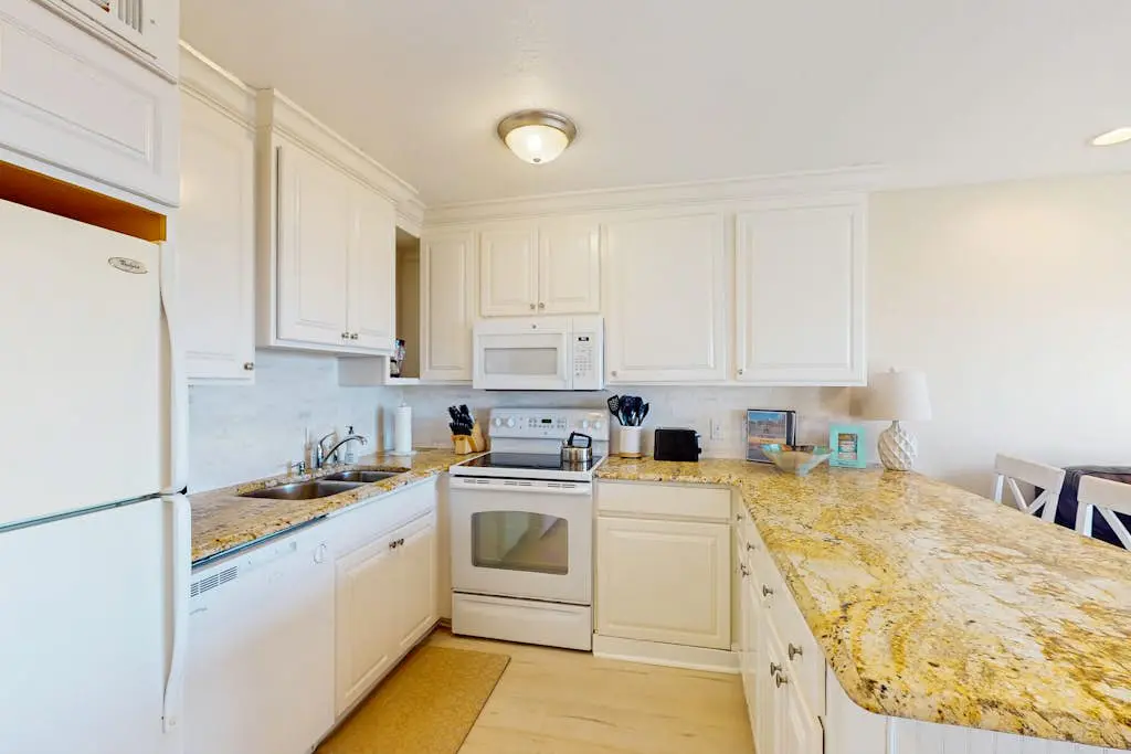 Coastal condo w/ a shared pool - steps to the beach Near shopping