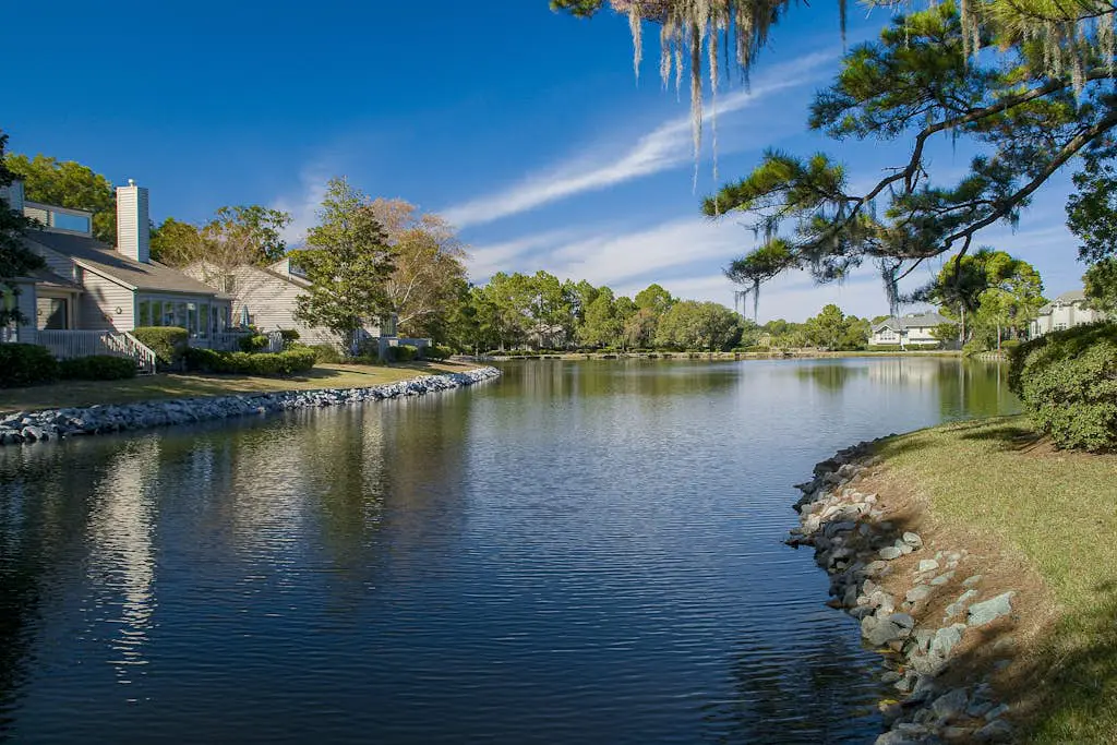 Retreat w/ panoramic lagoon views, shared pool, golf courses & tennis courts