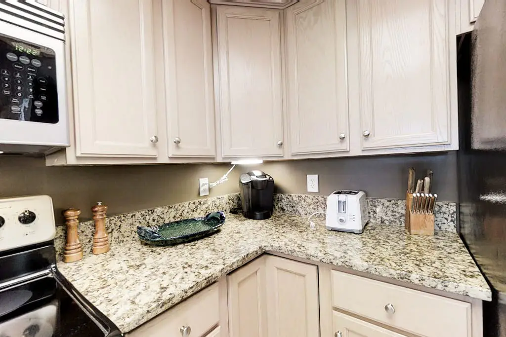 Coastal condo on the beach w/ panoramic views, beach access & a shared pool