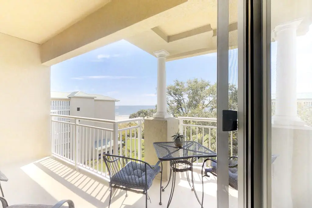 Coastal condo on the beach w/ panoramic views, beach access & a shared pool