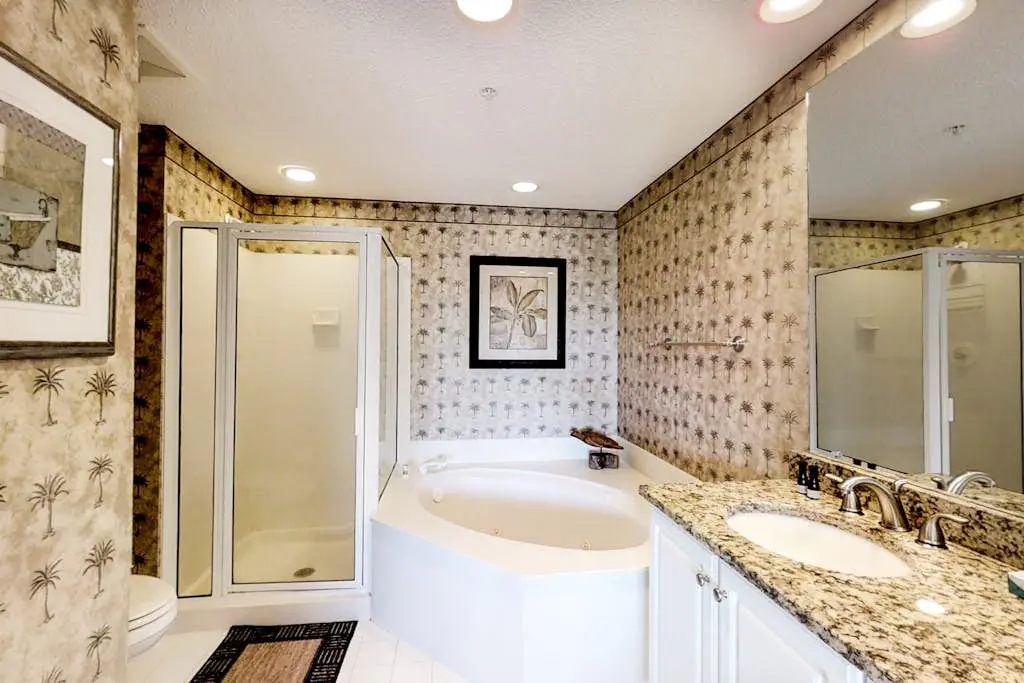 Coastal condo on the beach w/ panoramic views, beach access & a shared pool