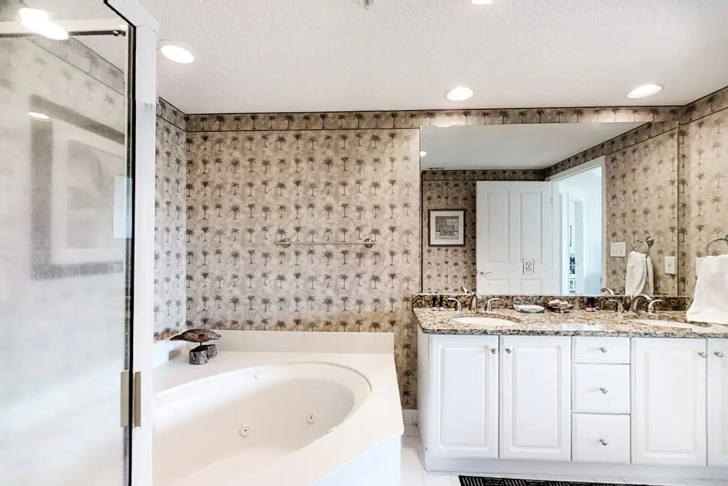 Coastal condo on the beach w/ panoramic views, beach access & a shared pool