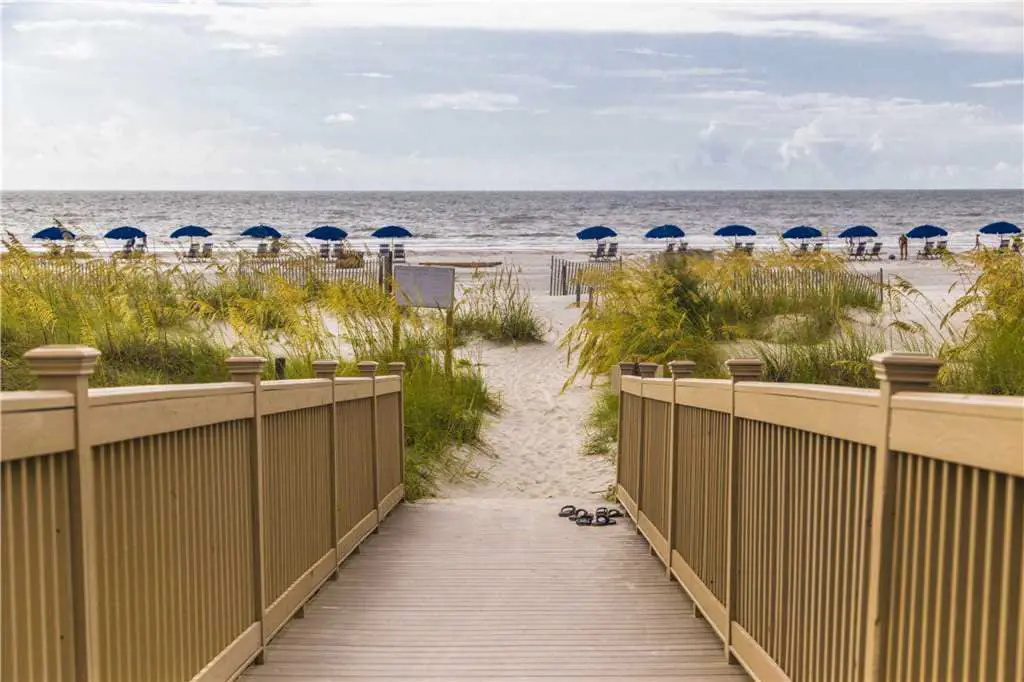 Coastal condo on the beach w/ panoramic views, beach access & a shared pool