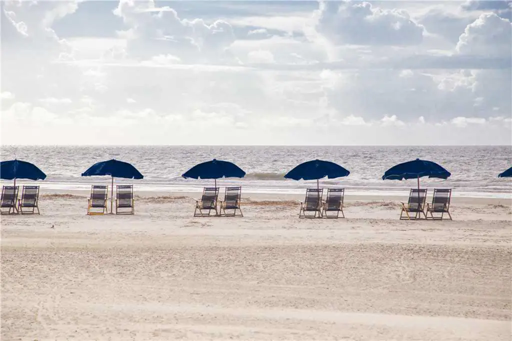 Coastal condo on the beach w/ panoramic views, beach access & a shared pool