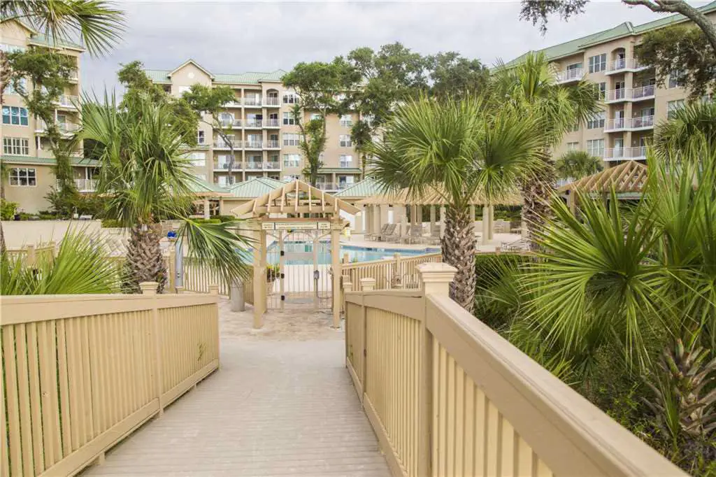 Coastal condo on the beach w/ panoramic views, beach access & a shared pool