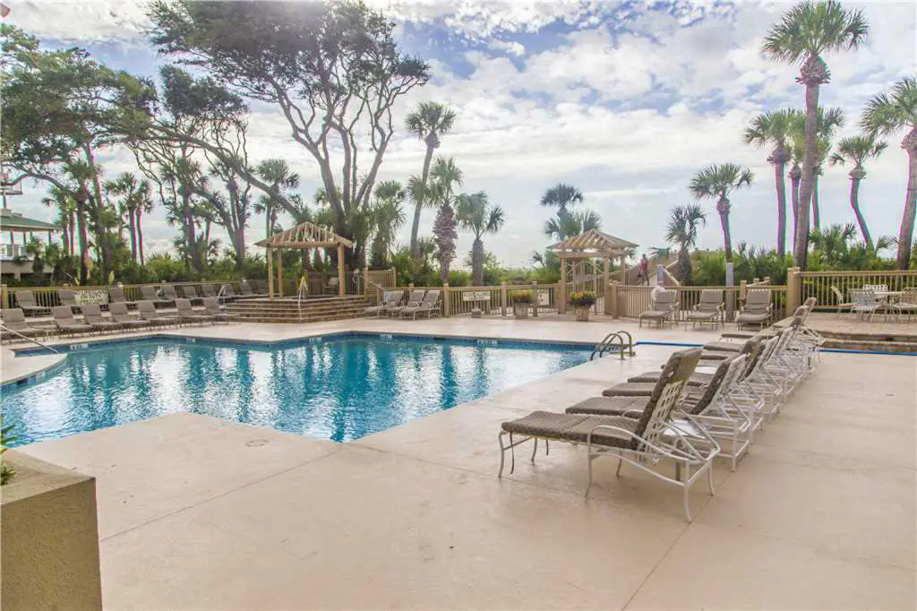 Coastal condo on the beach w/ panoramic views, beach access & a shared pool