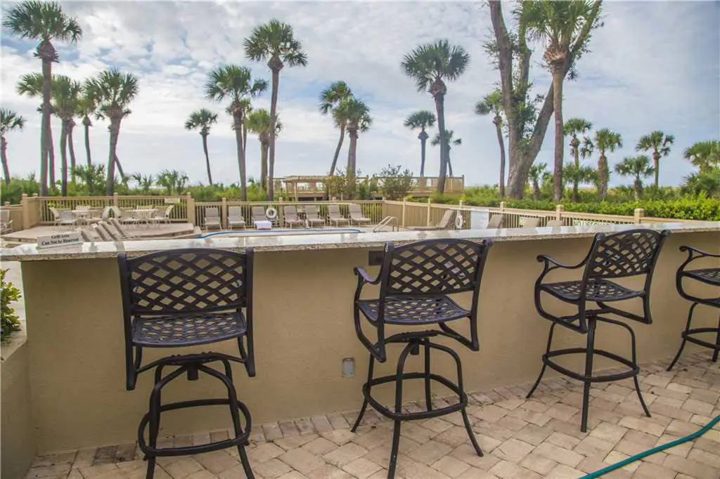 Coastal condo on the beach w/ panoramic views, beach access & a shared pool