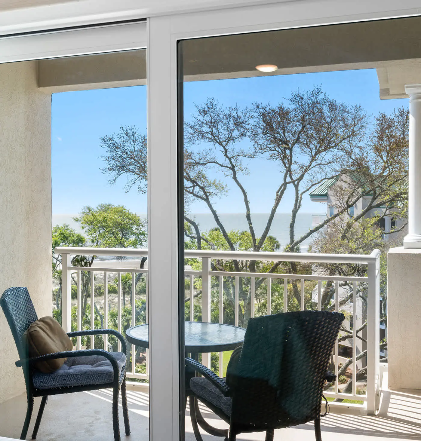 Coastal condo on the beach w/ panoramic views, beach access & a shared pool