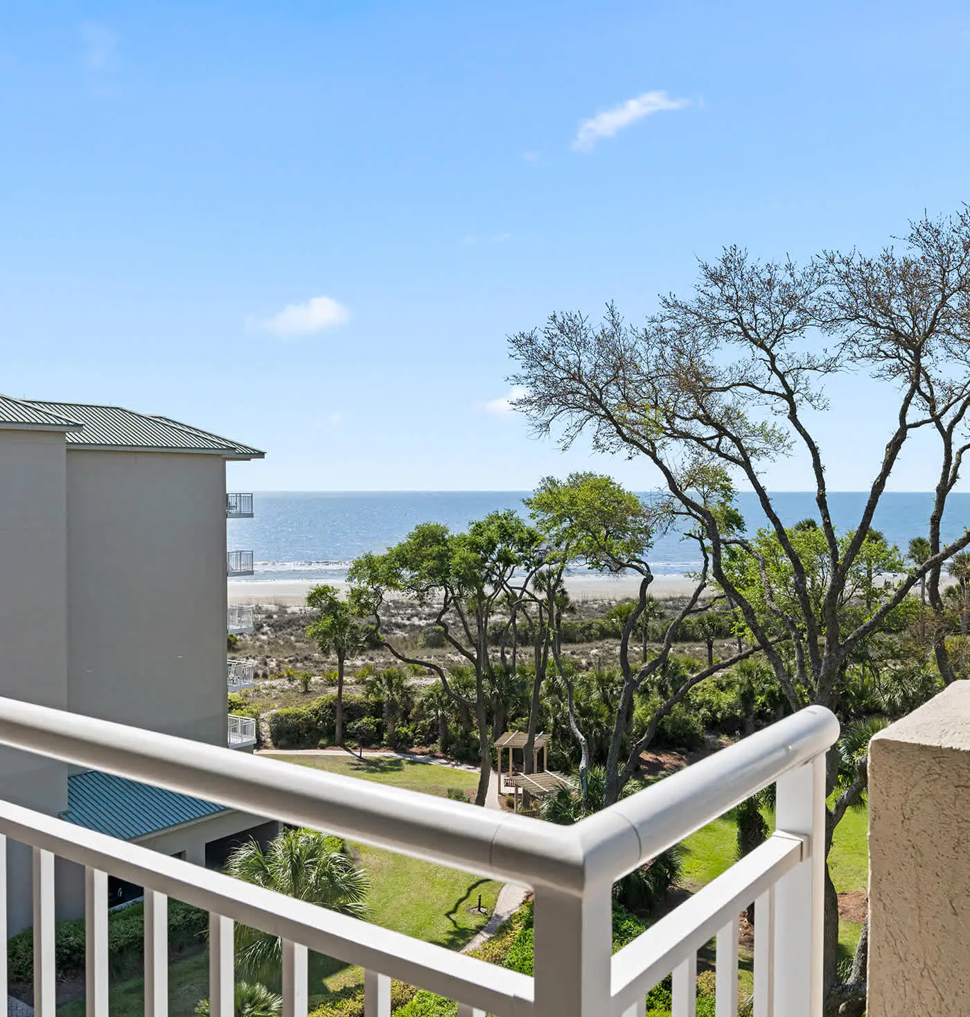 Coastal condo on the beach w/ panoramic views, beach access & a shared pool