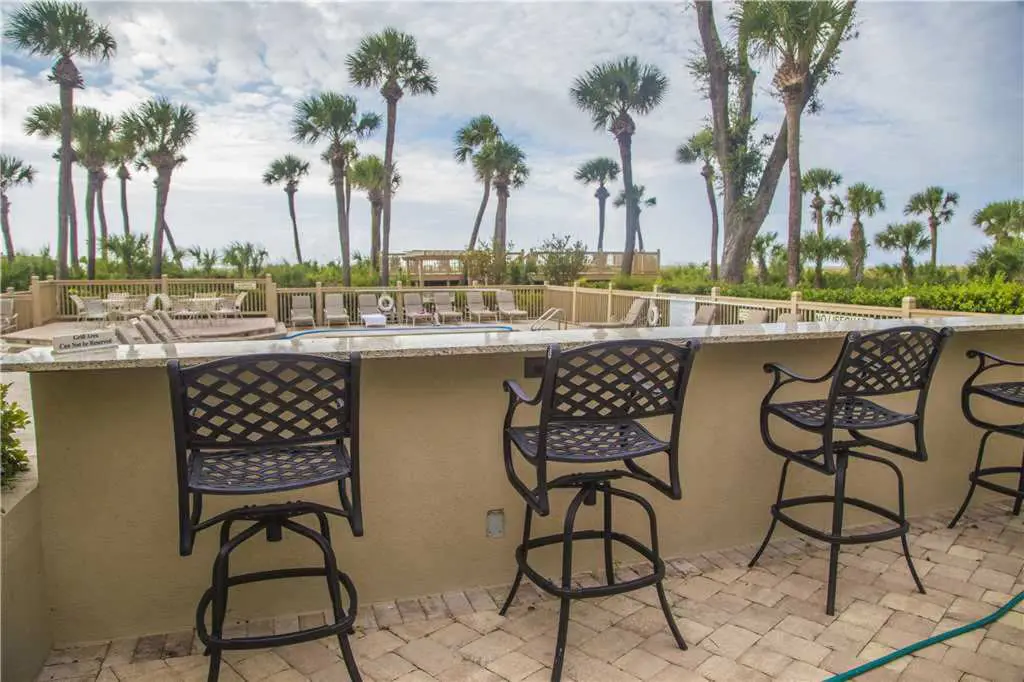 Coastal condo on the beach w/ panoramic views, beach access & a shared pool