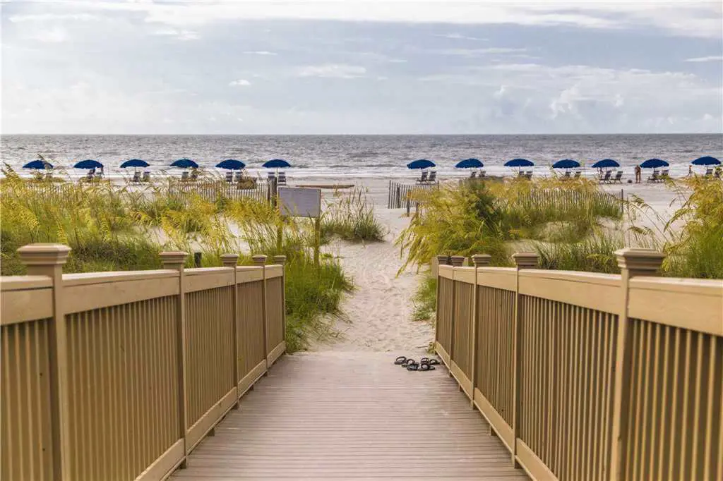 Coastal condo on the beach w/ panoramic views, beach access & a shared pool