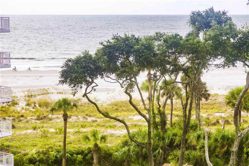 Coastal condo on the beach w/ panoramic views, beach access & a shared pool