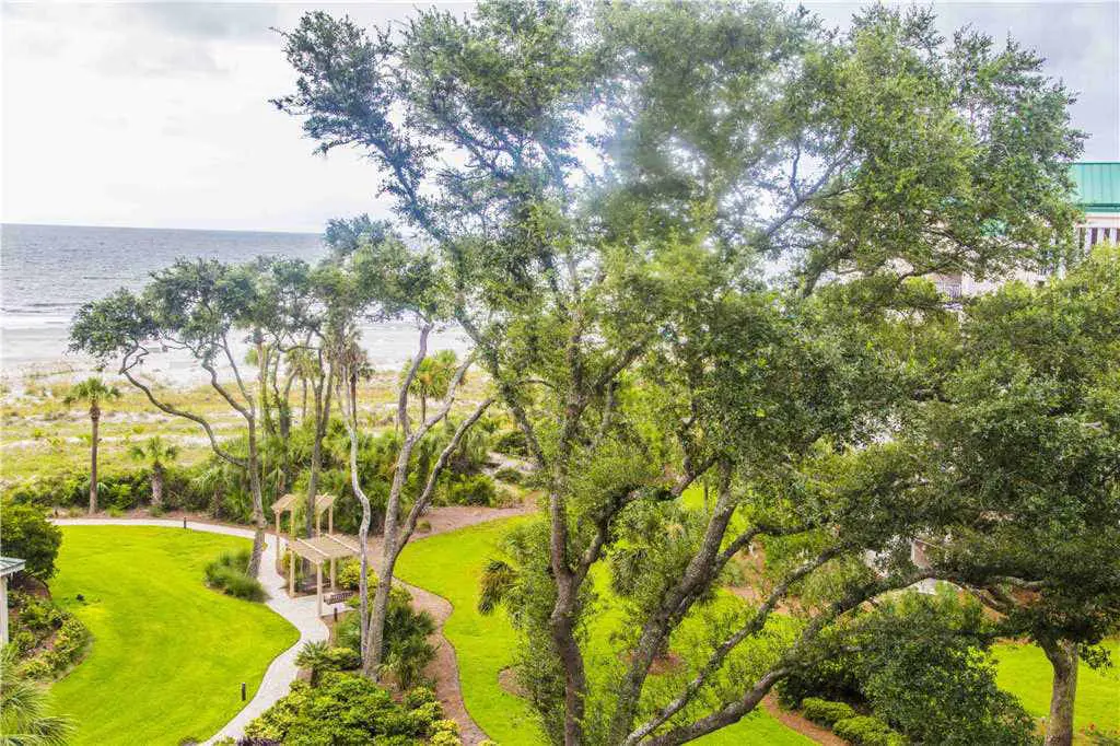 Coastal condo on the beach w/ panoramic views, beach access & a shared pool