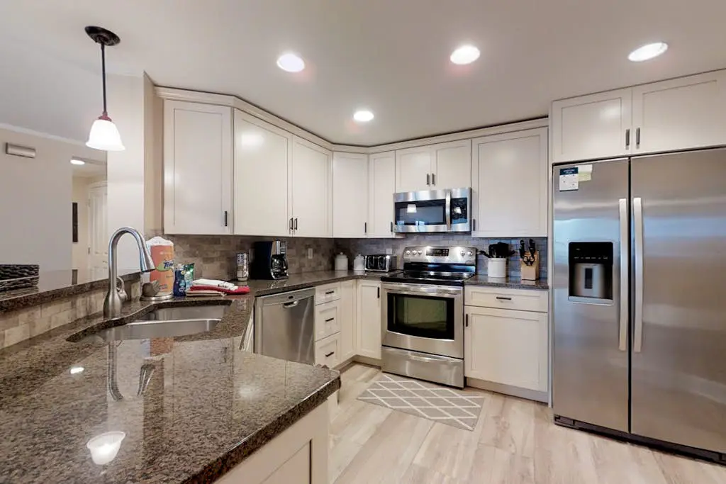 Dreamy condo on the beach w/ balcony view, shared pool, & charming decor